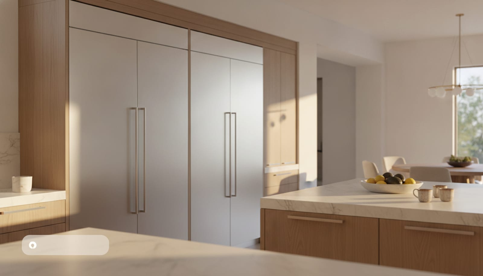 Range of built-in stainless refrigeration columns in a refined luxury kitchen